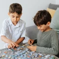 Trefl Puzzle 60 W świecie Piesków